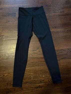 lululemon athletica full length mid waisted black leggings. Size 4. Like new!